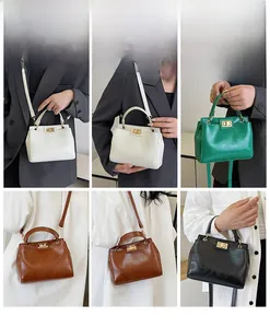 Retro top-handle handbags in white, green, brown, and black with gold metal turn-lock detail