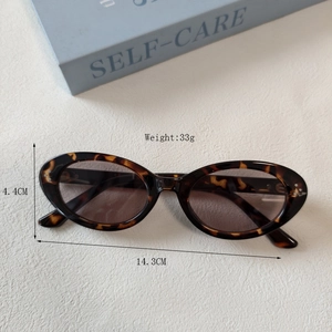 Retro leopard print oval cat eye sunglasses for men and women with UV400 protection