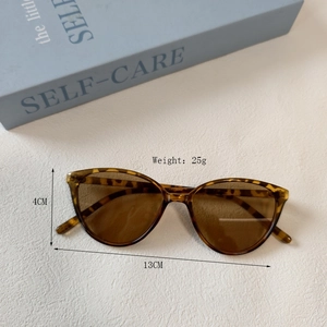 Lunettes de soleil vintage œil de chat pour enfants avec monture écaille ambre