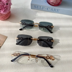 Three rimless sunglasses with gradient lenses and gold geometric metal temples