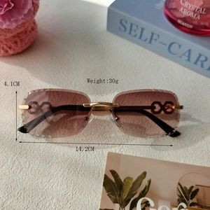 Unisex rimless sunglasses with gradient brown lenses and golden chain link temples