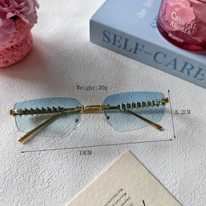 Fashion rimless sunglasses with blue gradient lenses and gold metal rivets for women