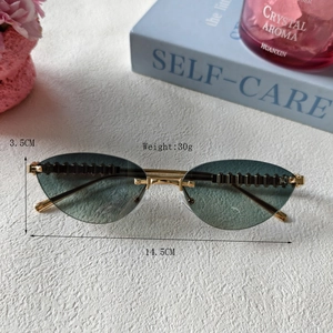 Lunettes de soleil œil de chat sans monture avec verres dégradés et branches dorées