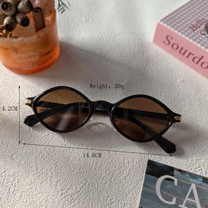 Retro oval black sunglasses with brown lenses and gold metal accents weighing only 20g