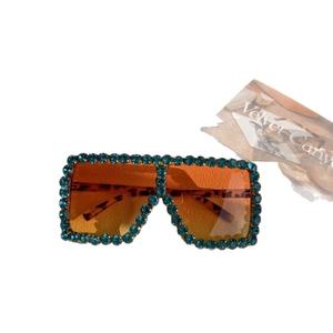Square oversized sunglasses with blue rhinestones, orange gradient lenses and leopard arms