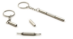 Macro detail of portable 3-in-1 mini screwdriver keychain showing internal bits