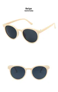 Dettaglio degli occhiali da sole retrò beige con montatura rotonda da varie angolazioni