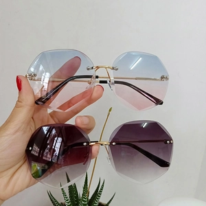 Women's rimless polygonal metal sunglasses with gradient ocean lenses and slim temples