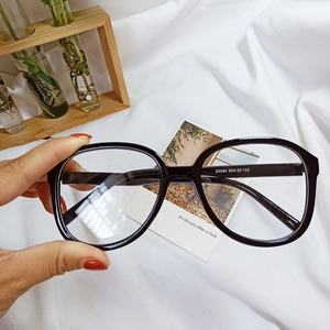 Detail view of black oversized sunglasses frame with temple model number Z3334 55-20-132