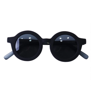 Lunettes de soleil rondes vintage pour enfants avec monture noire mate et verres UV