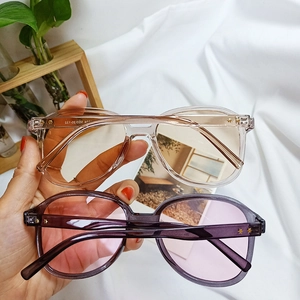 Handheld vintage oversized sunglasses with star rivets and 55-18-145 size specifications