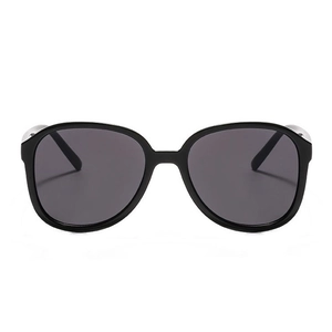 Retro oversized square sunglasses with black frames and dark grey lenses for street style