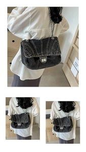 Détail du sac cabas en denim délavé vintage avec coutures géométriques et chaîne