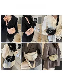 Detailed views of a quilted crescent crossbody bag with chain and adjustable strap
