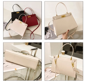 Détail du fermoir rotatif en métal et des coutures en cuir du sac de style Kelly