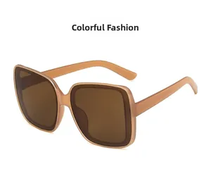 Close-up of oversized jelly tea square sunglasses with translucent frames and matching lenses