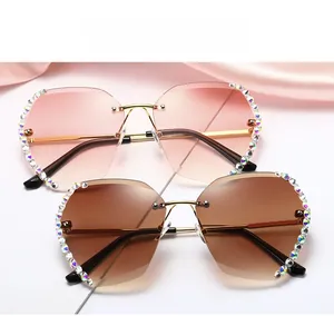 Detail of rimless sunglasses with gradient lenses and rainbow rhinestone-encrusted edges