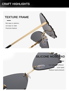 Detail of golden metal hinges and soft silicone nose pads on oversized rimless sunglasses