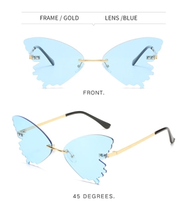 Detail of blue butterfly shaped rimless sunglasses with gold metal frame and rhinestones
