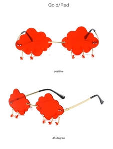 Frameless cloud-shaped sunglasses with gold frame and red lenses with waterdrop pendants