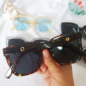Collection of oversized square sunglasses in leopard, yellow, and grey acetate frames