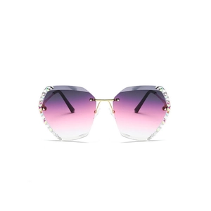 Women's rimless butterfly sunglasses with purple gradient lenses and rhinestone edges