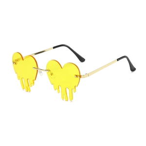 Frameless heart shaped melting drip sunglasses with yellow lenses and gold metal frame