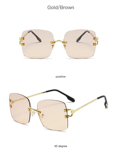 Detail of rimless square sunglasses with gradient brown lenses and gold C-decor hinges