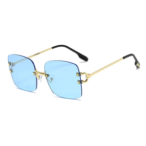Frameless square sunglasses with light blue gradient lenses and gold C-shaped hinges