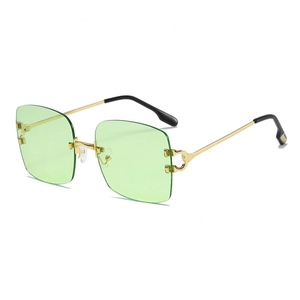 Retro square rimless sunglasses with light green resin lenses and golden metal frames