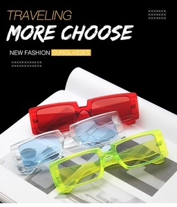 Three pairs of vintage square sunglasses in red, blue, and yellow transparent frames