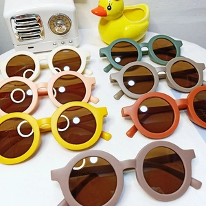Fashionable round frame kids sunglasses with UV protection in multiple matte colors