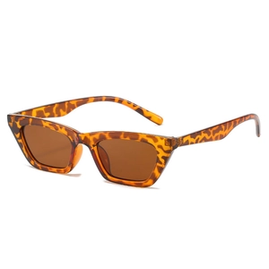Retro tortoise shell cat eye sunglasses with amber lenses in a minimalist vintage frame