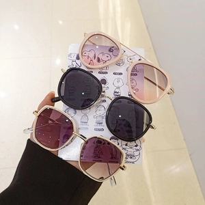 Three pairs of vintage-style kids sunglasses with irregular metal frames in three colors