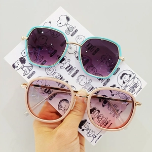 Detail of square oversized metal sunglasses with blue and pink gradient lenses