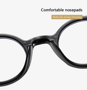 Detail of comfortable integrated nose pads on black eyewear frame for pressure relief