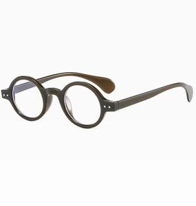 Detail view of vintage round eyewear frames in deep translucent tortoiseshell acetate finish