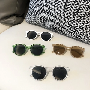 Retro round cartoon sunglasses for kids in four colors with UV protection lenses