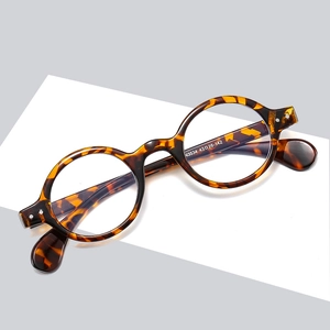 Classic tortoise shell round frame optical glasses with vintage acetate finish and metal studs