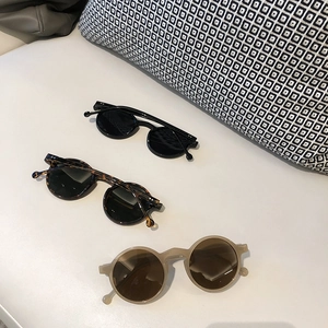Retro round frame sunglasses for men and women in black, tortoiseshell and tea colors