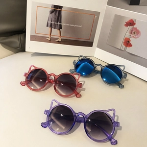 Kids cat-ear sunglasses in pink, blue, and purple with UV protection and stylish frames