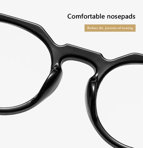 Détail des plaquettes de nez confortables sur monture ronde noire pour moins de pression