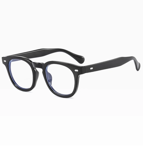 Detail view of classic black eyeglass frame with silver rivets and blue light blocking lenses