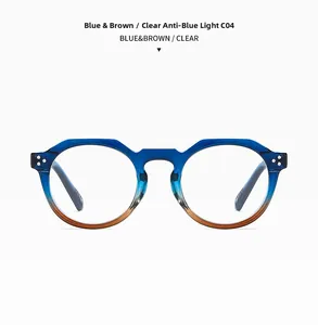 Détail de lunettes rondes à dégradé bleu et marron avec verres anti-lumière bleue