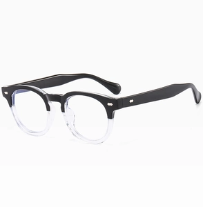 Detail view of semi-rimless eyeglass frames with silver rivet accents and clear nose pads