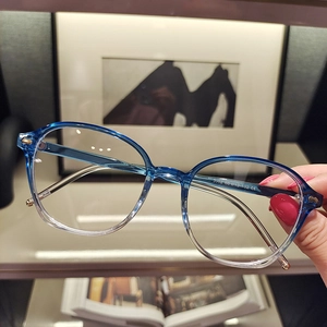 Detail of blue and white gradient frame showing sturdy metal hinge and lightweight material
