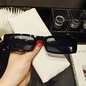 Detailed view of black rectangle sunglasses showing inner temple specifications 58-13-132 CE