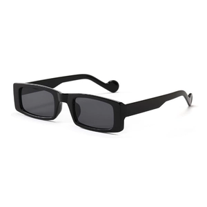Rectangle black sunglasses with unique wavy temple design and dark grey UV lenses on white