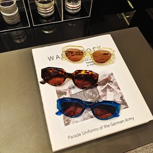 Retro polygon cat eye sunglasses in yellow, tortoiseshell and blue for modern women