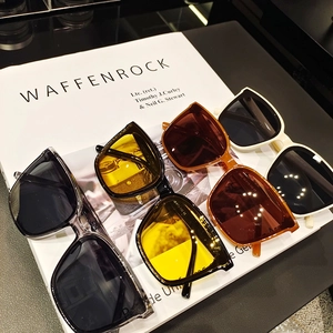 Classic square frame sunglasses in multiple colors including black, amber, and ivory